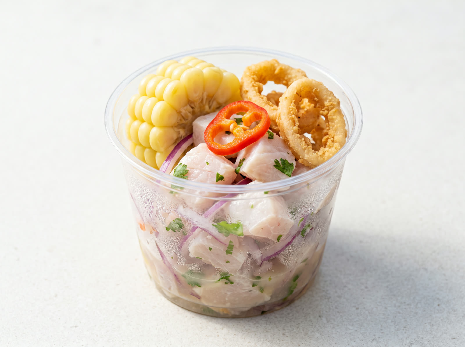Fresh ceviche cup with corn and calamari