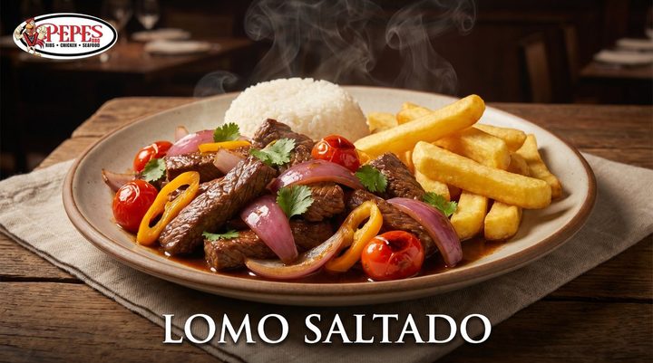 Lomo saltado beef stir fry with french fries and rice at Pepe's BBQ