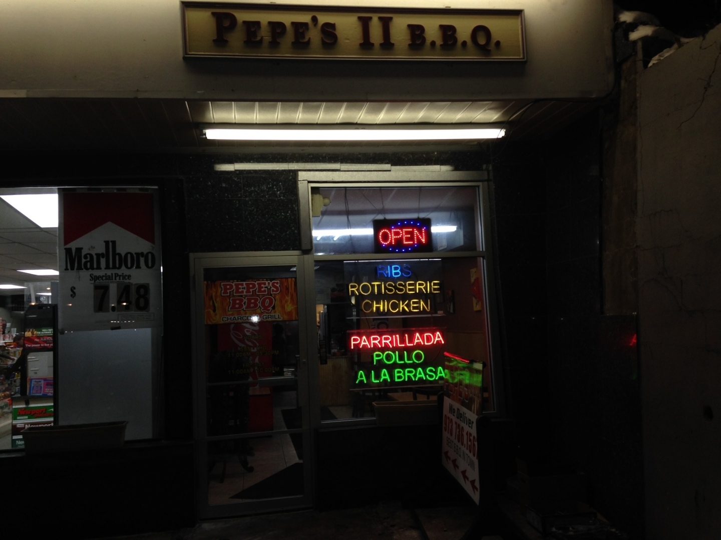The original Pepe's BBQ storefront at night